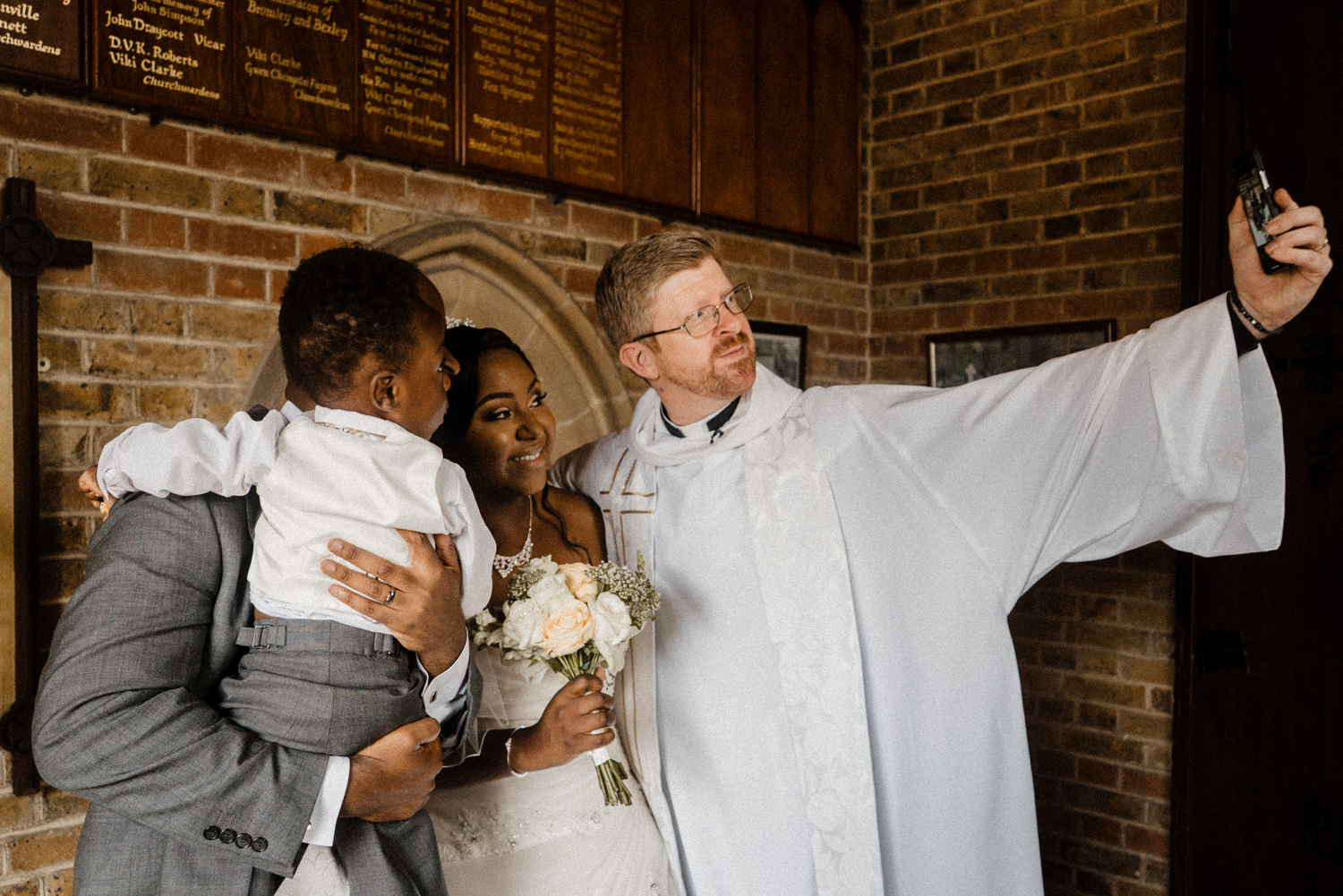 Nigerian-Wedding-Photographer-Priest-Selfie-Bride-Groom