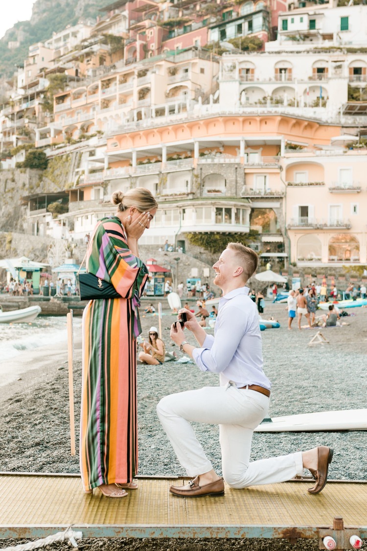 Proposing on the beach of Positano in Italy