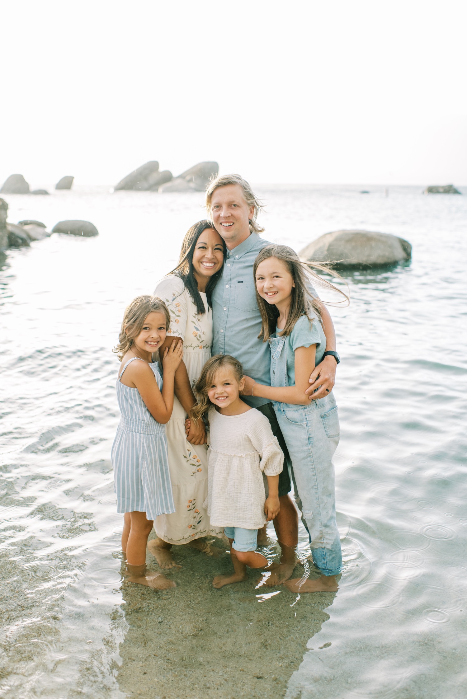 Free Photos - A Joyful Moment As A Family Of Four Poses Together For A  Picture. The Parents And Their Two Children Are Standing Closely, Creating  A Heartwarming Scene Filled With Love
