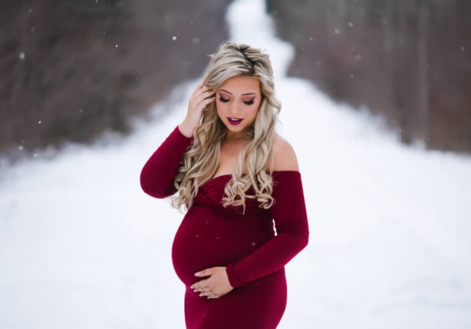 Photo of a Pregnant Woman Wearing a Blue Dress · Free Stock Photo