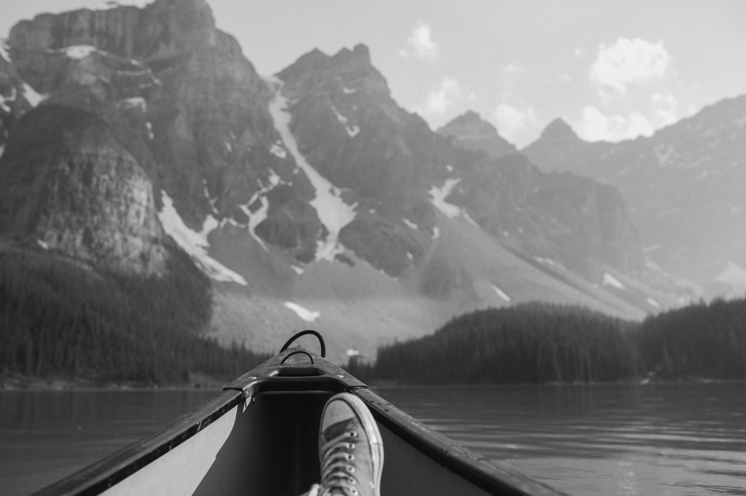 black and white detail shot of canoeing on Moraine Lake in Alberta Canada