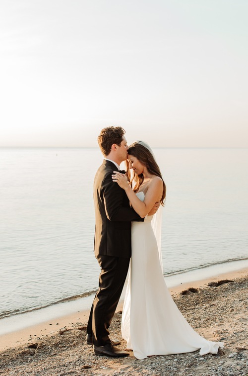 Schitt's Creek Star Noah Reid Marries Fiancée Clare in Beachside Ceremony