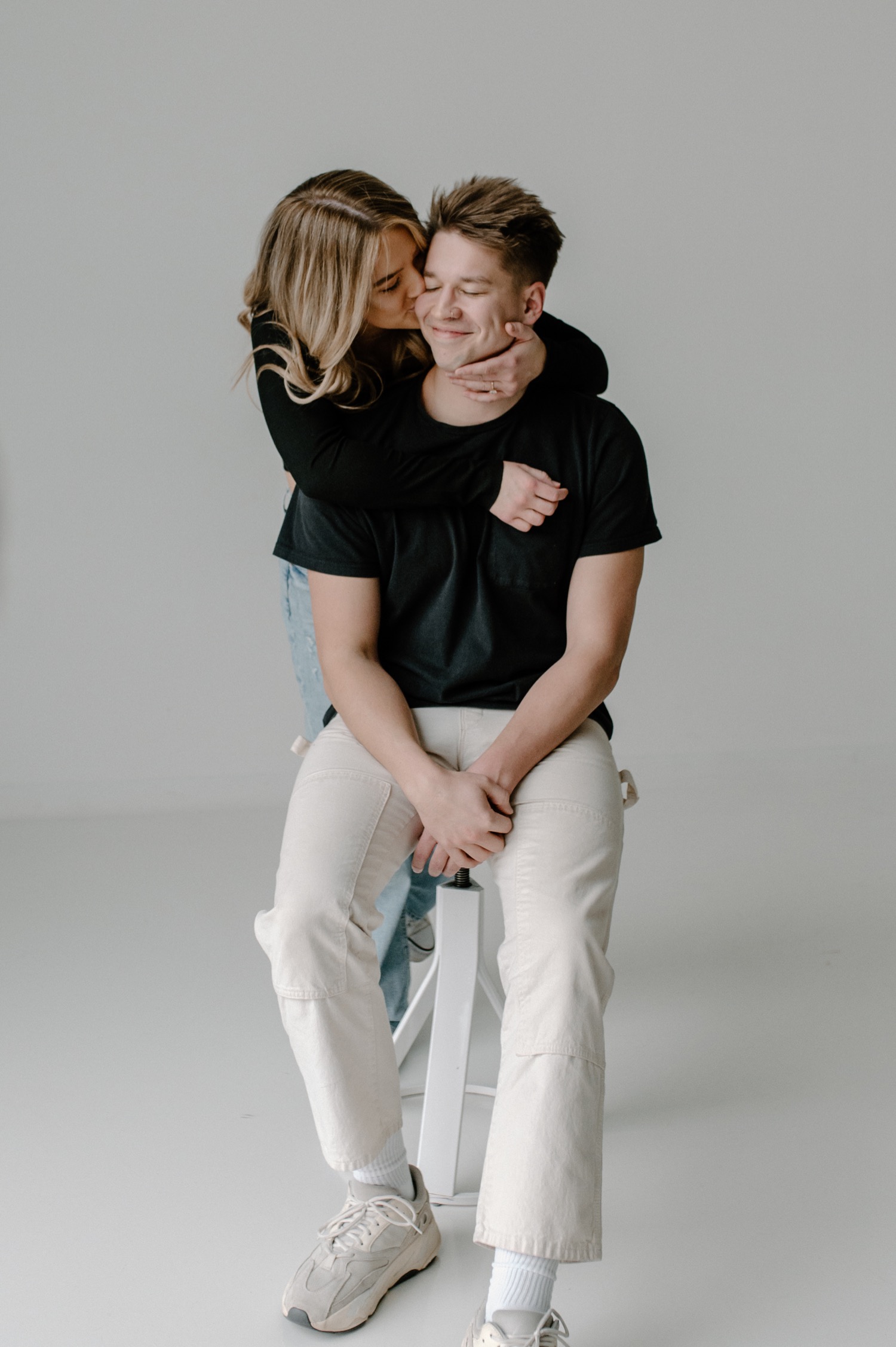 Premium Photo | Full shot cute couple posing together in studio
