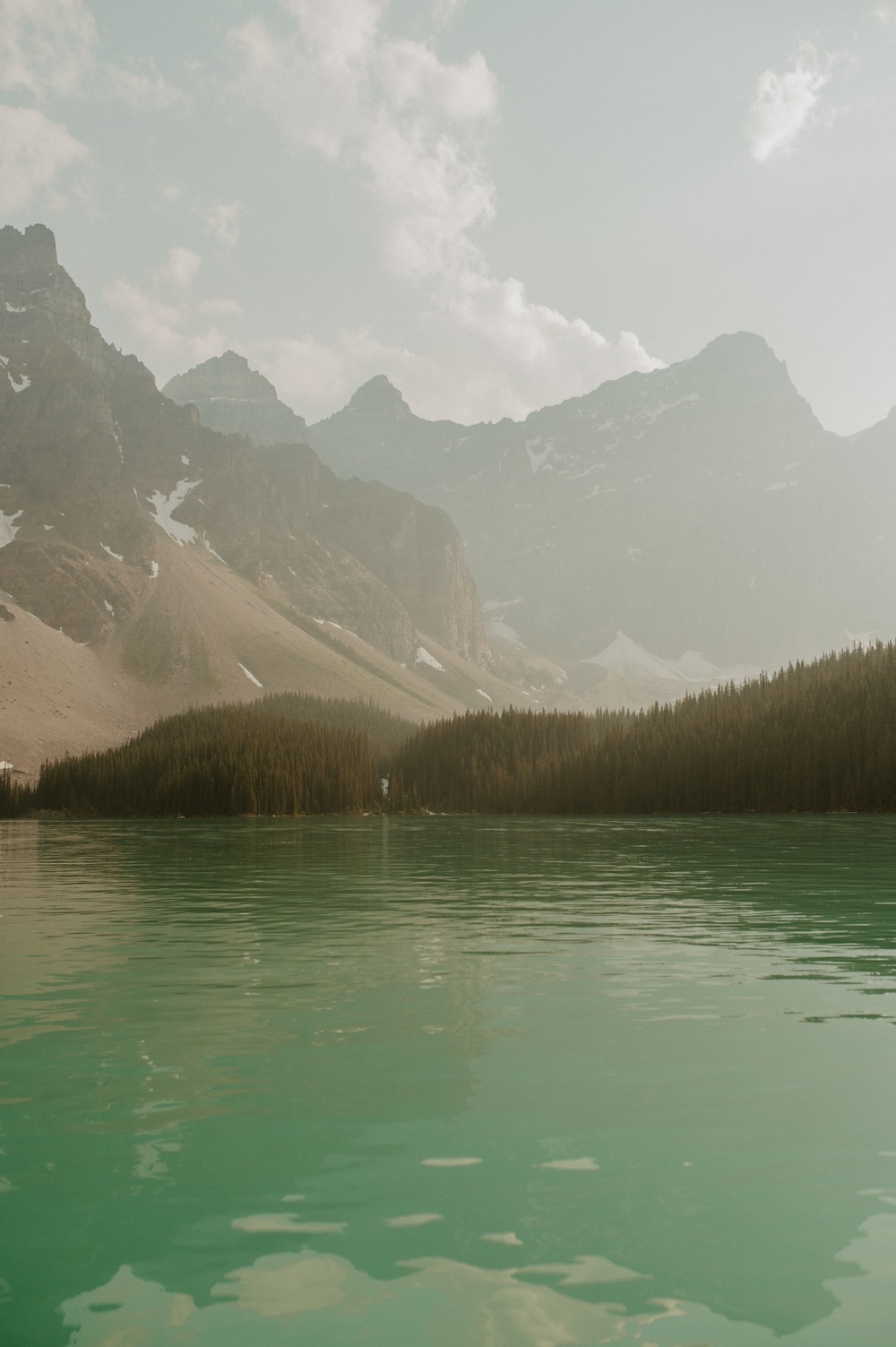 Sunny shot of Moraine Lake from a canoe in the summer of 2021