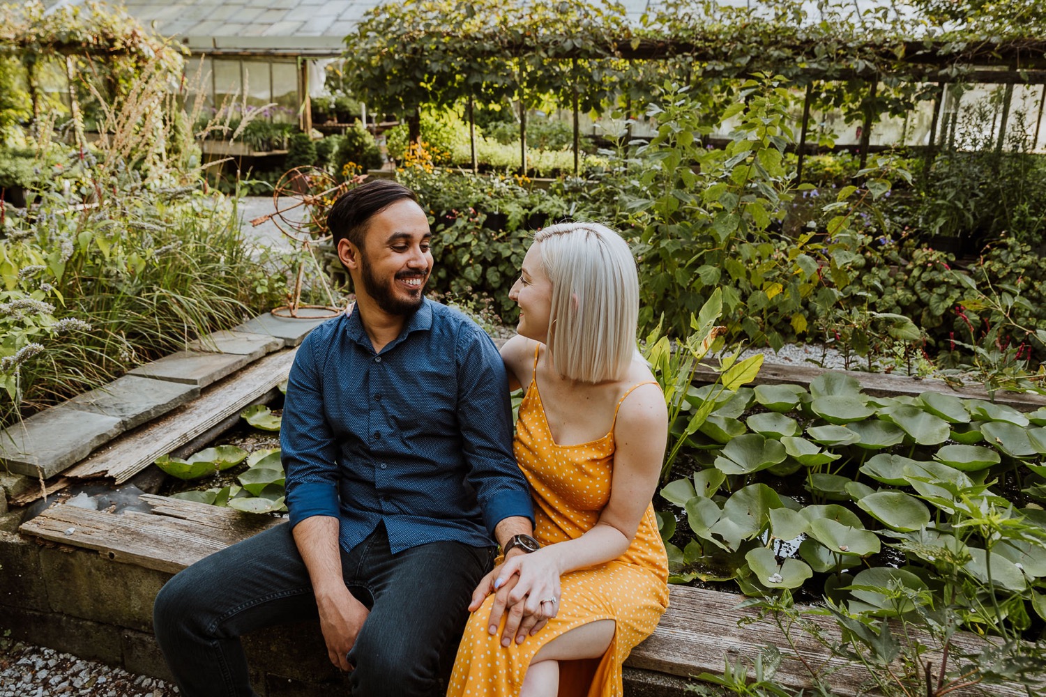 Portrait of a young couple in the garden - Stock Photo - Masterfile -  Premium Royalty-Free, Code: 630-01075955