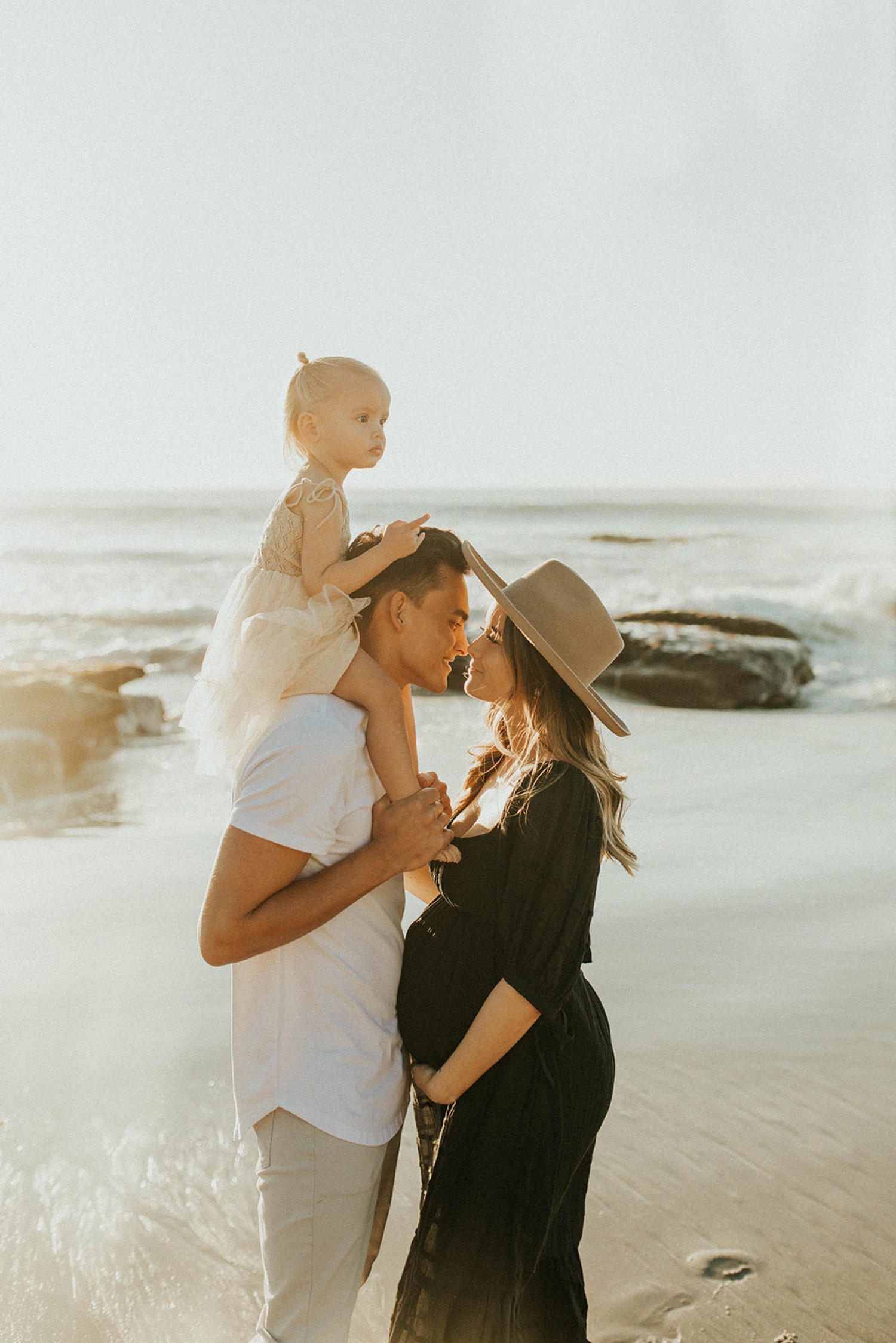 Studio and Sunset Beach Maternity Session With Expecting Parents